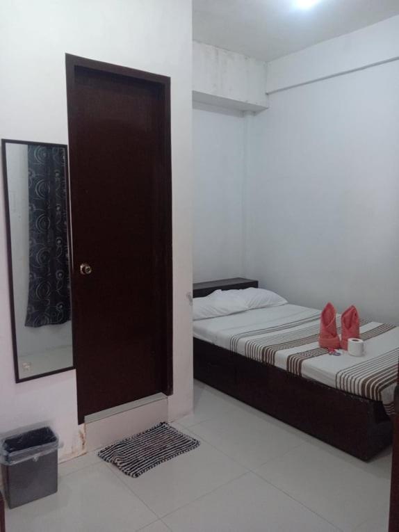 Chelle'S Apartelle-Inn เอลนิโด ภายนอก รูปภาพ