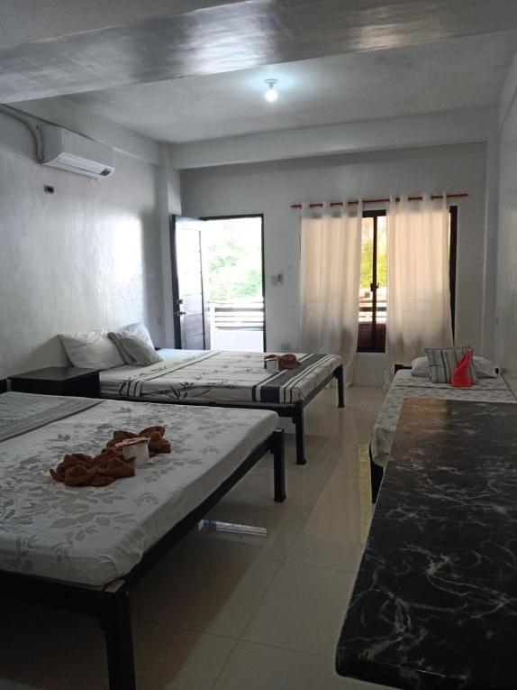 Chelle'S Apartelle-Inn เอลนิโด ภายนอก รูปภาพ